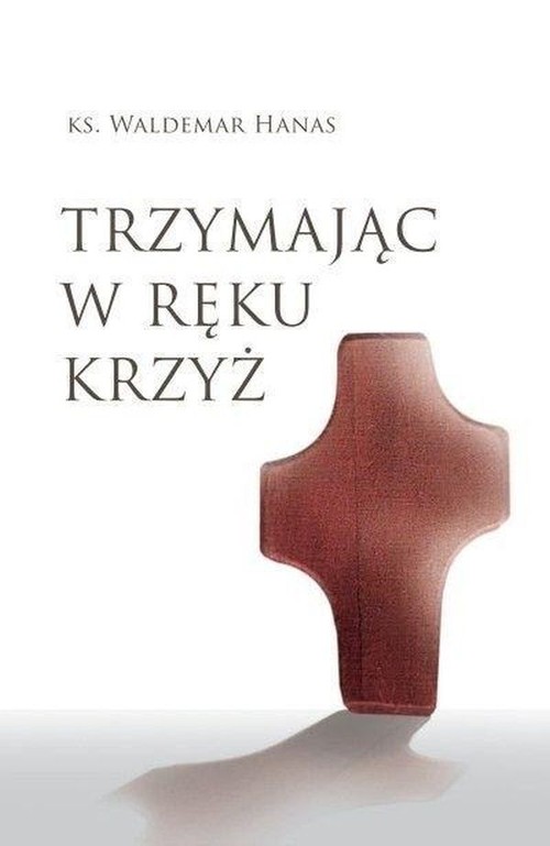 Image of Trzymając w ręku krzyż